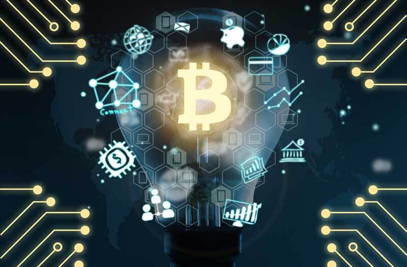 Light bulb with money symbols and B for Blockchain