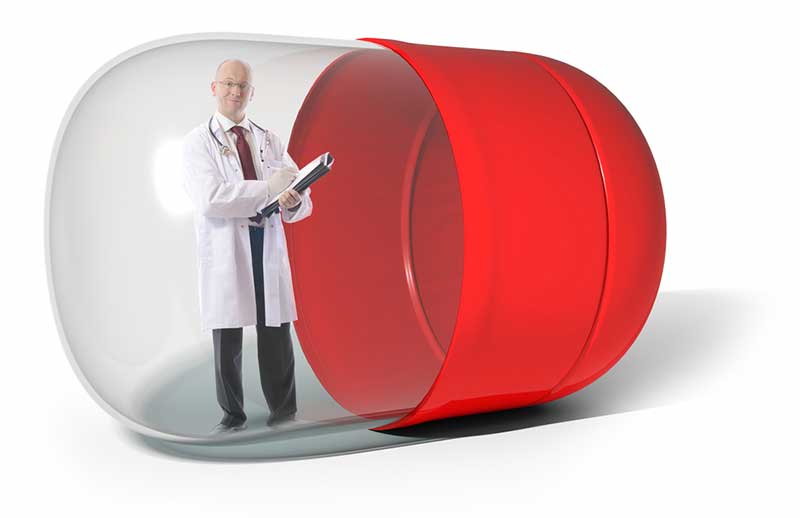Doctor inside a transparent capsule