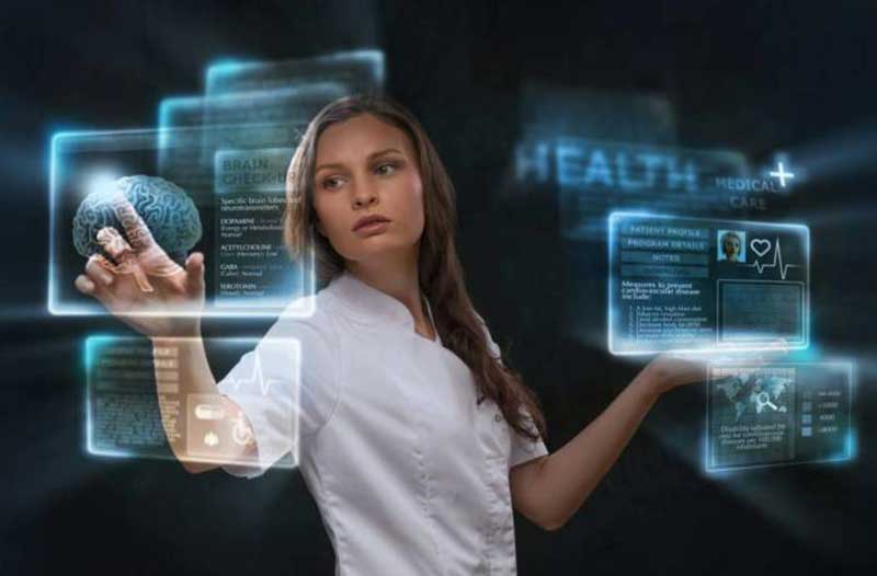 Young woman touches digital screen with image of brain