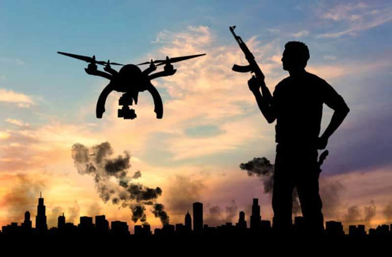 Black outlines of a man with a rifle and a drone hovering beside him