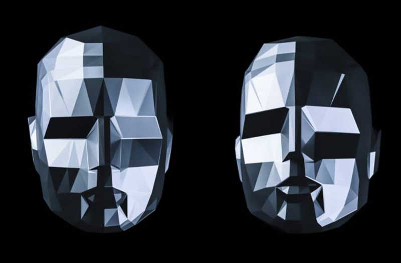 two robot heads on a black background