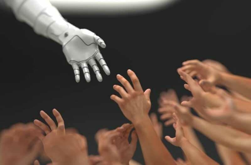 A robotic hand reaching out to human hands