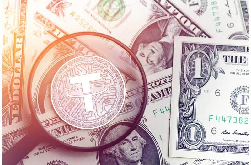 American dollar bills and cryptocurrency Tether