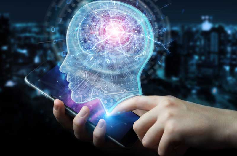 Two hands holding smartphone with hologram of human head and brain floating overhead