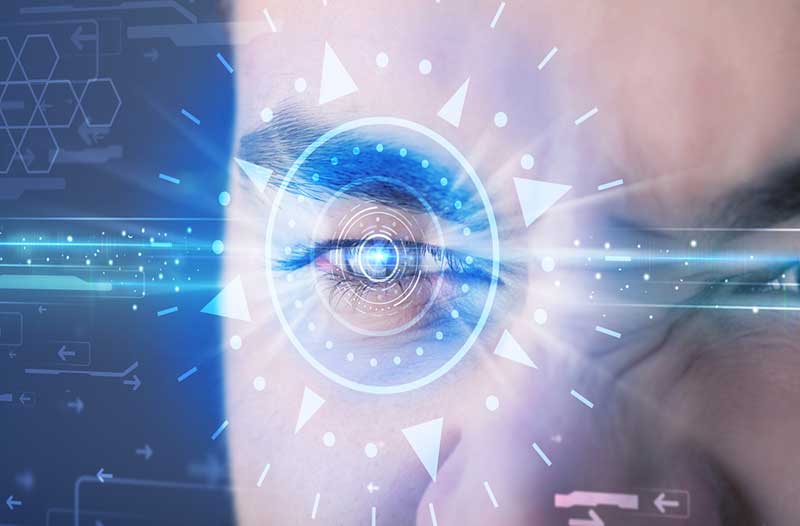 Face of man with digital circle around eye iris scanning
