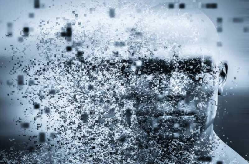 Digital particles forming the face of a humanoid robot
